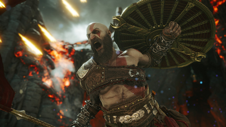 Kratos screaming as he holds his sheild over his head in God of War: Ragnarok