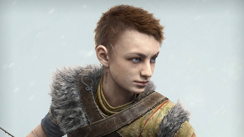 Sunny Suljic as the voice of Atreus in a snowy setting in God of War Ragnar&ouml;k