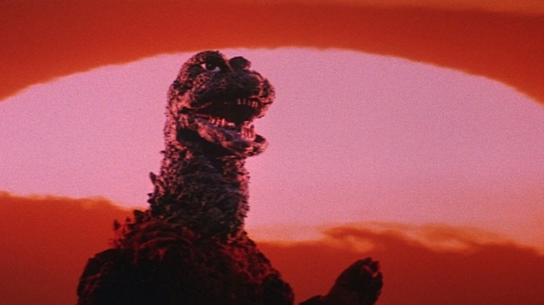 Godzilla roaring in front of the sunset in Godzilla vs. Hedorah