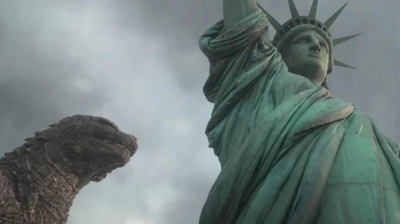 Godzilla walking by the Statue of Liberty in Godzilla Minus Zero
