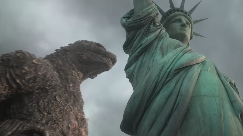 Godzilla walking by the Statue of Liberty in Godzilla Minus Zero