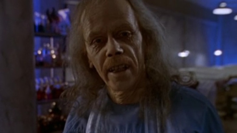 John Carpenter as The Coroner in Body Bags