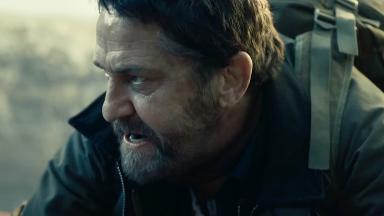 Gerard Butler as John Garrity looking alarmed in Greenland 2: Migration