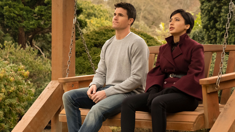 Robbie Amell and Andy Allo in Upload