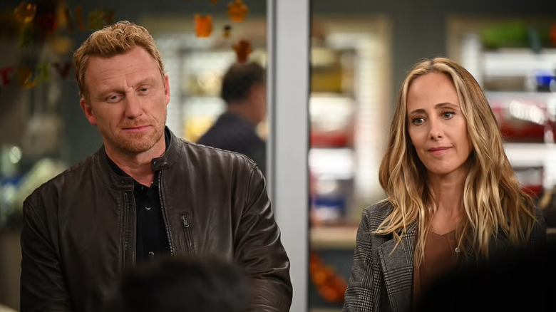 Owen and Teddy looking pensive in a patient room on Grey's Anatomy