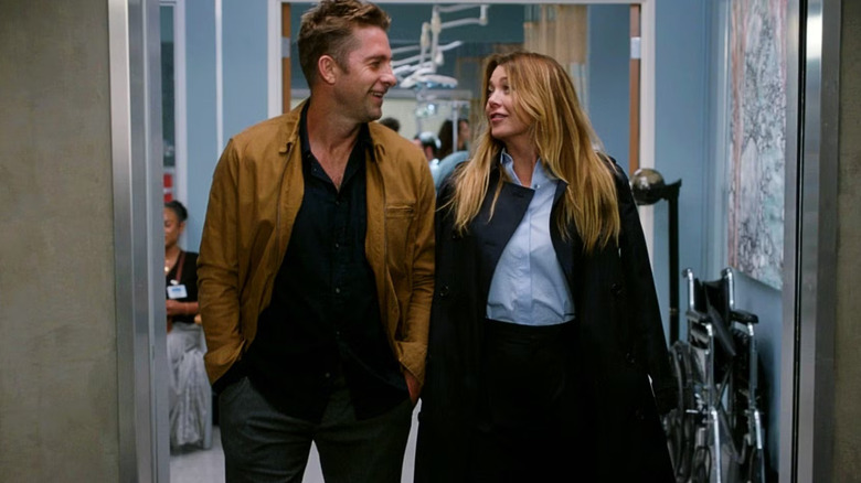 Nick and Meredith walking through the hospital in Grey's Anatomy