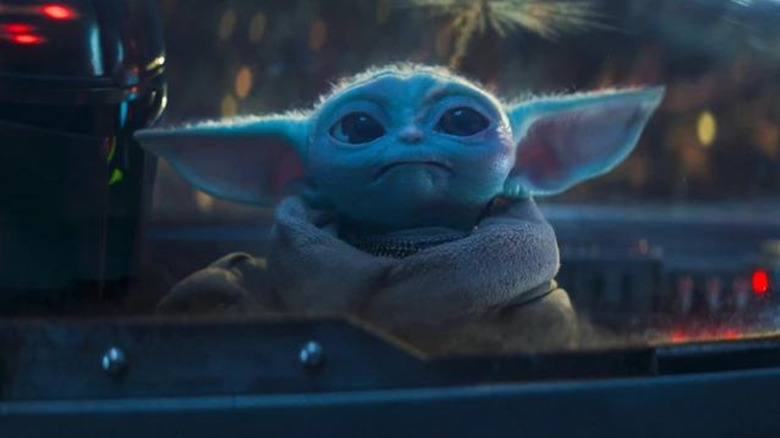 Grogu watching fireworks in The Mandalorian