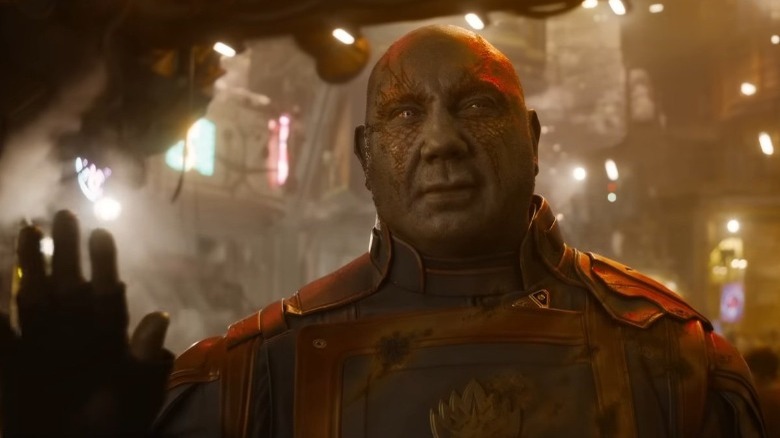 Drax in uniform with hand up