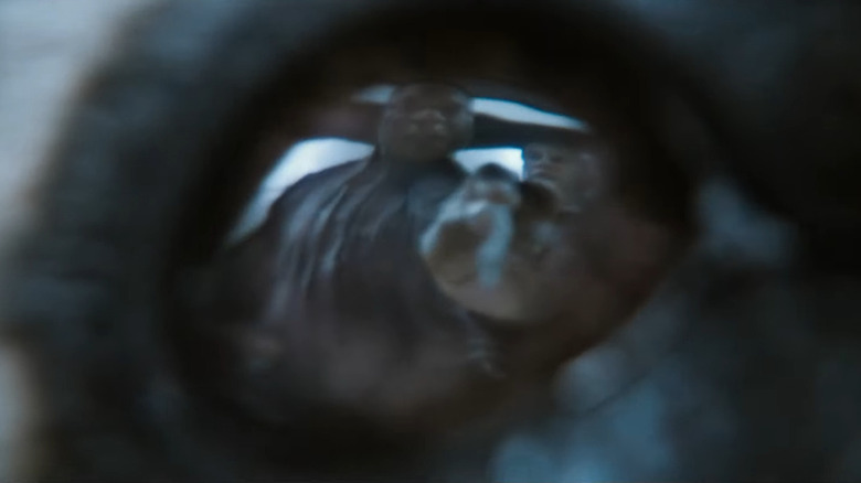 The High Evolutionary's reflection in Baby Rocket's eye in Guardians of the Galaxy Vol. 3