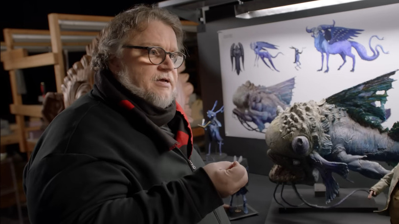 Guillermo del Toro and some of his Pinocchio models
