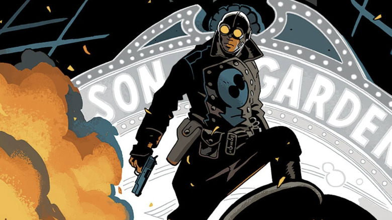Lobster Johnson standing on top of a crashed car in comic book form