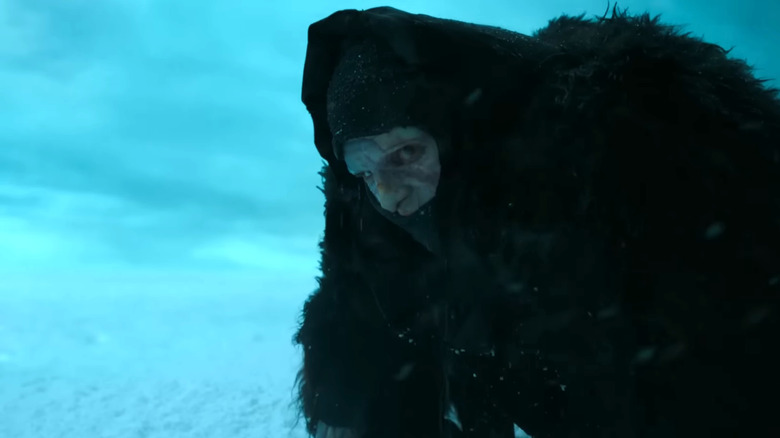 Frankenstein, the creature kneeling in the arctic ice