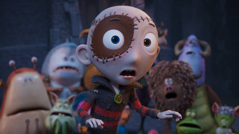 Stitch Head with a bunch of monsters in the background in Stitch Head