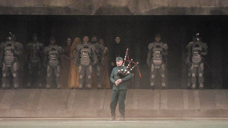 Dune, a bagpiper leads the way for the Atreides 