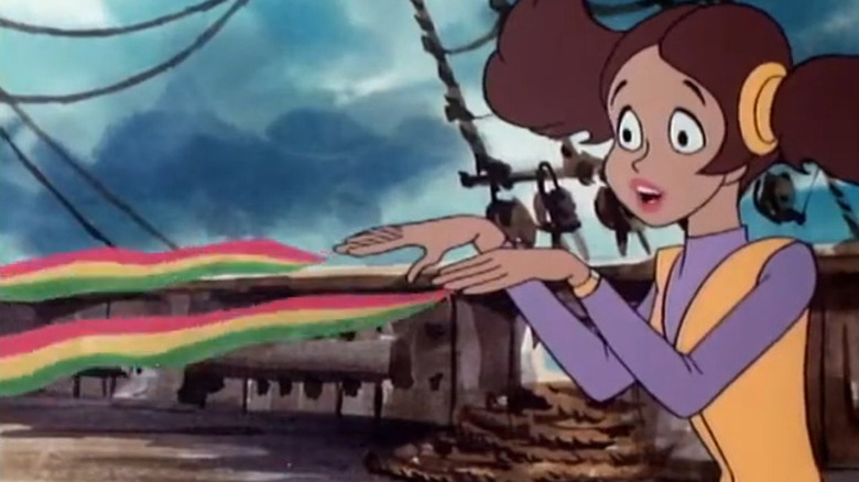 Cupcake firing rainbows from her fingers on a pirate ship in The Fonz and the Happy Days Gang