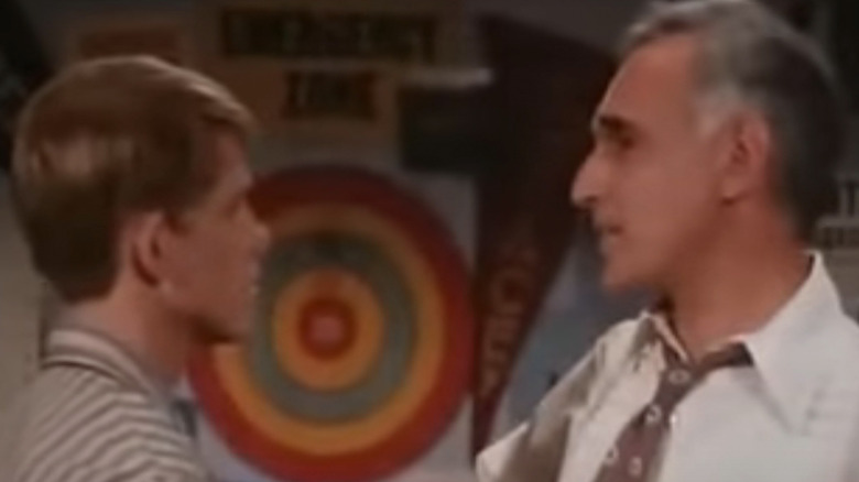 Ron Howard's Richie Cunningham talks to Harold Gould's Howard Cunningham in Love and the Happy Days