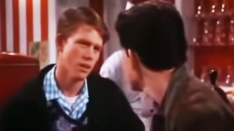 Ron Howard's Richie Cunningham talks to Anson Williams' Potsie Weber in Love and the Happy Days