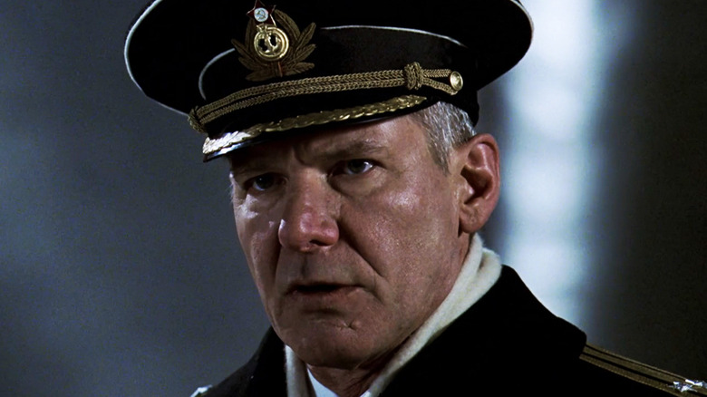 Harrison Ford's Captain Alexi Vostrikov stands outside in uniform in K-19 The Widowmaker