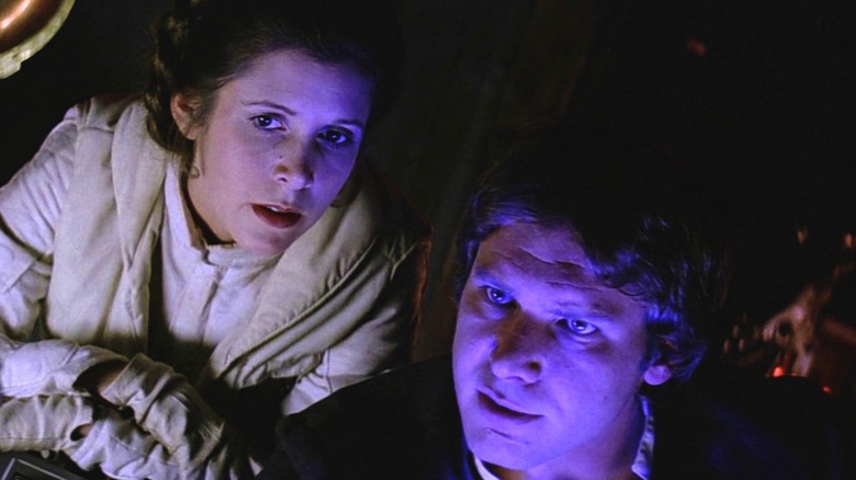 Carrie Fisher and Harrison Ford in The Empire Strikes Back