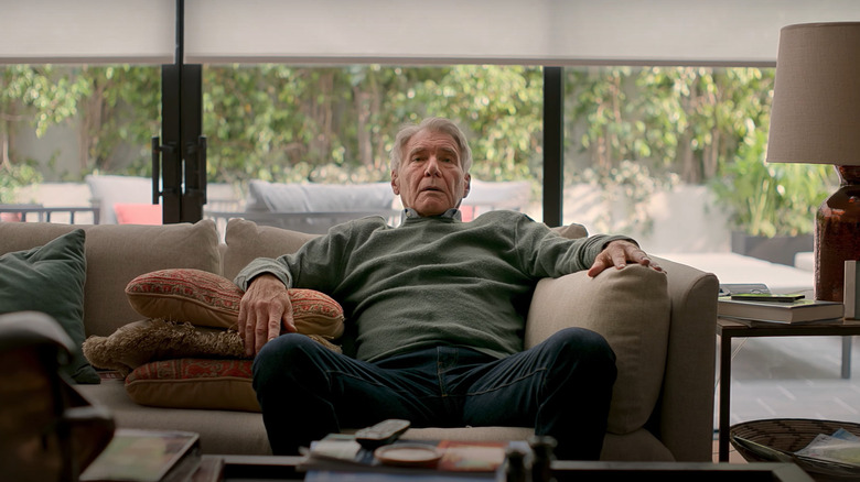 Dr. Paul Rhoades reclines on the couch, thinking about his life, in Shrinking