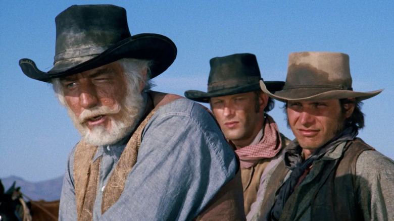 A group of cowboys, including Harrison Ford as Print, on Gunsmoke