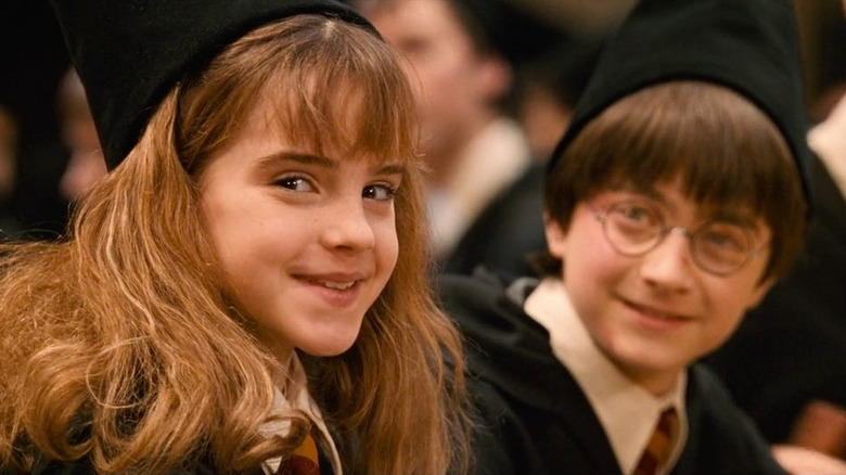Emma Watson and Daniel Radcliffe in Harry Potter and the Sorcerer's Stone