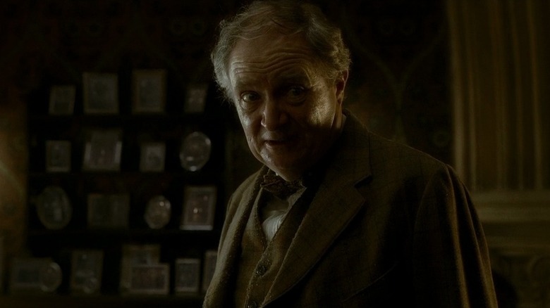 Slughorn (Jim Broadbent) cast in shadows in Harry Potter and the Half-Blood Prince