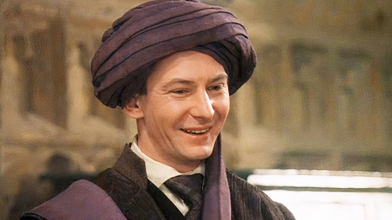 Quirrell smiling in the Great Hall in Harry Potter and the Sorcerer's Stone