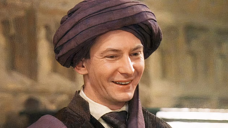 Quirrell smiling in the Great Hall in Harry Potter and the Sorcerer's Stone