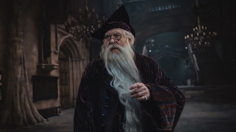 Albus Dumbledore walking down a hallway in Harry Potter and the Philosopher's Stone