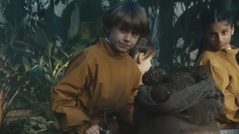 Neville Longbottom (Rory Wilmot) in Herbology class in Harry Potter and the Philosopher's Stone