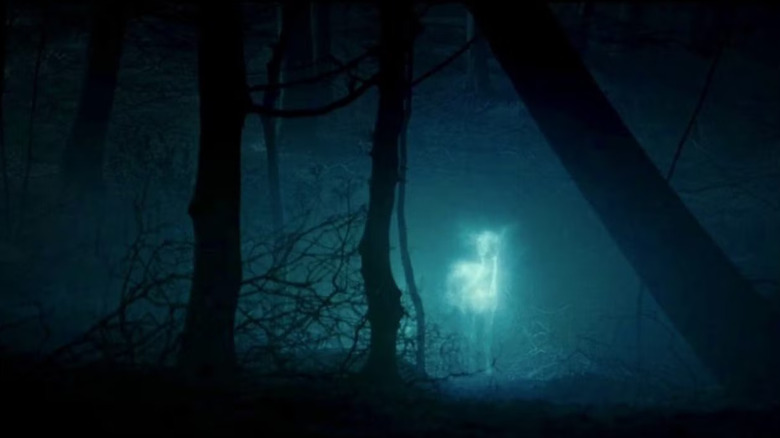 Silver doe Patronus in the woods in Harry Potter and the Deathly Hallows Part 1
