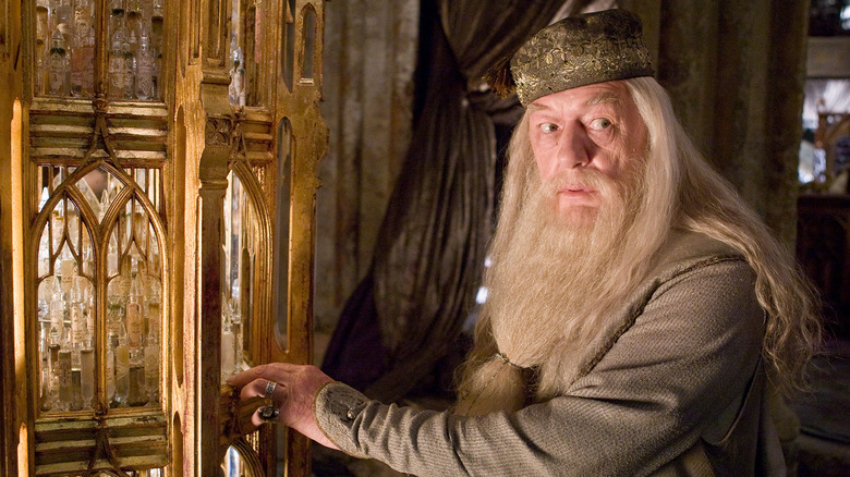 Dumbledore opening a cabinet full of memories in Harry Potter and the Half-Blood Prince