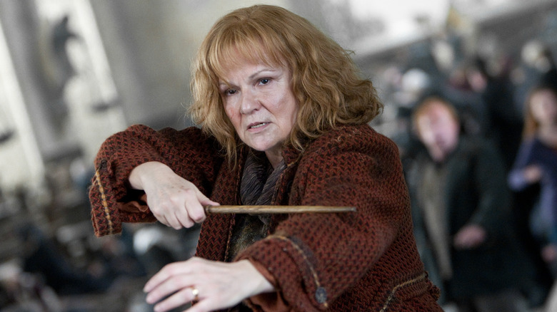 Molly Weasley (Julie Walters) readies her magic wand in Harry Potter and the Deathly Hollows: Part 2