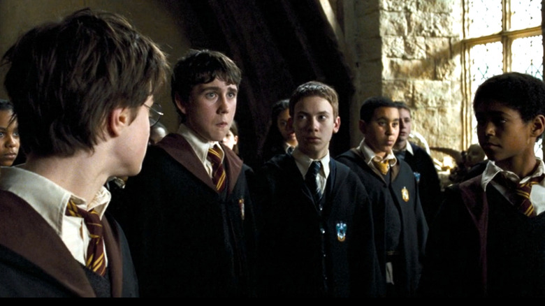 Prisoner of Azkaban, Neville being called on in class while Harry and Dean Thomas watch