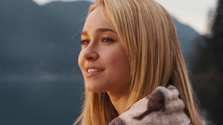 Hayden Panettiere as Beth Cooper smiling next to a lake in I Love You, Beth Cooper