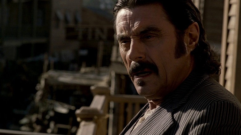 Ian McShane's Al Swearengen looks incredulously offscreen in Deadwood