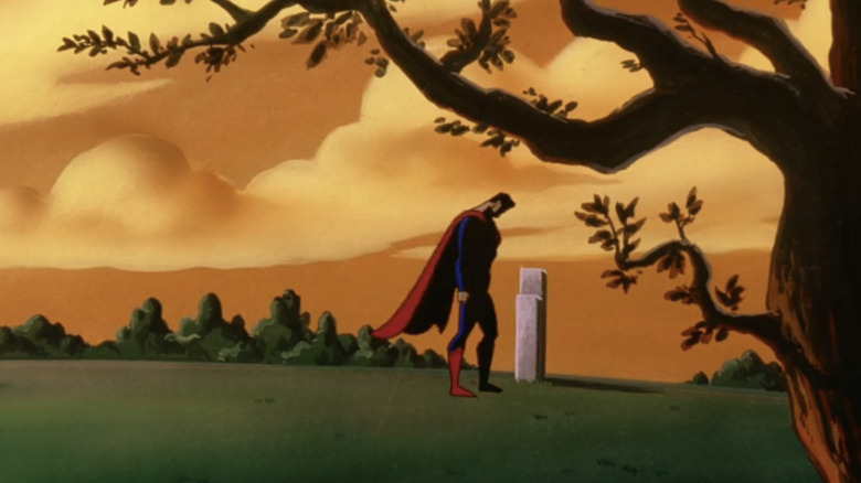 Superman stands over the grave of Dan Turpin in Superman The Animated Series