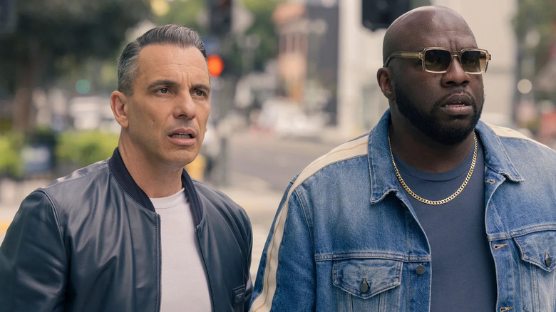 Sebastian Maniscalco as Danny and Omar Dorsey as Ray looking alarmed in Bookie