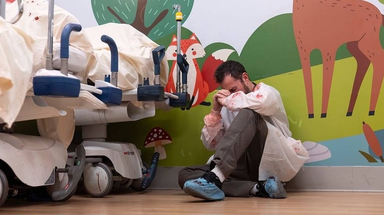 Robby crying on the floor in the pediatric ER on The Pitt
