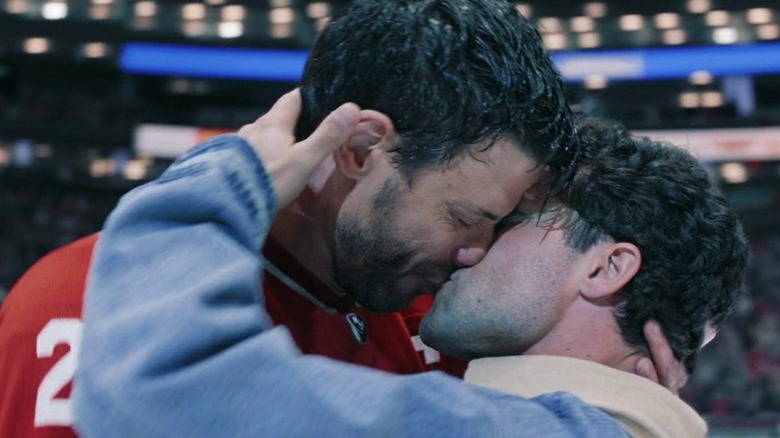 Scott Hunter kissing Kip on the ice in Heated Rivalry