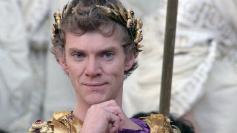 Caligula smirking in Caligula