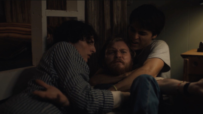 Chris and Bobby hold Jason down in Hell of a Summer