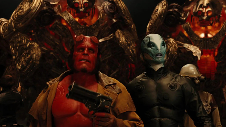 Hellboy II: The Golden Army - Helboy, Abe Sapien, and Johan Krauss surrounded by the Golden Army