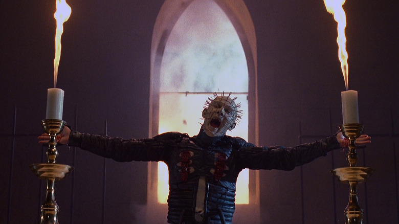 Pinhead standing with his arms outstretched like a crucifix in Hellraiser III: Hell on Earth