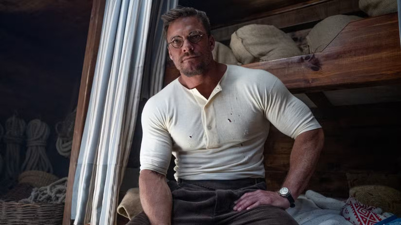Anders Lassen sitting on his bunk in The Ministry of Ungentlemanly Warfare