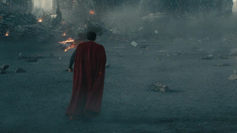Henry Cavill's Superman prepares to take flight amid rubble in Man of Steel