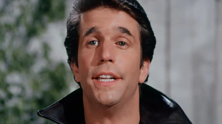 Henry Winkler as Fonzie smiling in Happy Days