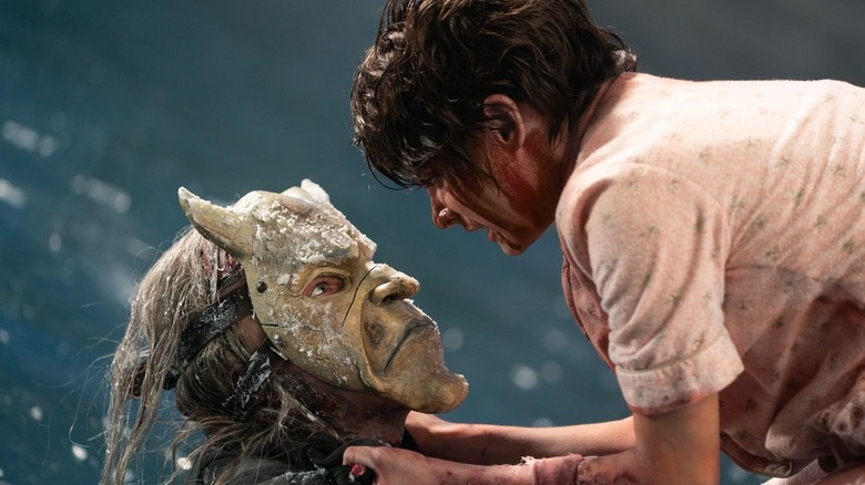 Ethan Hawke as The Grabber faces off with Madeleine McGraw as Gwen in Black Phone 2