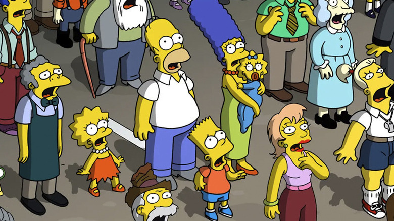 The Simpsons cast looking skyward